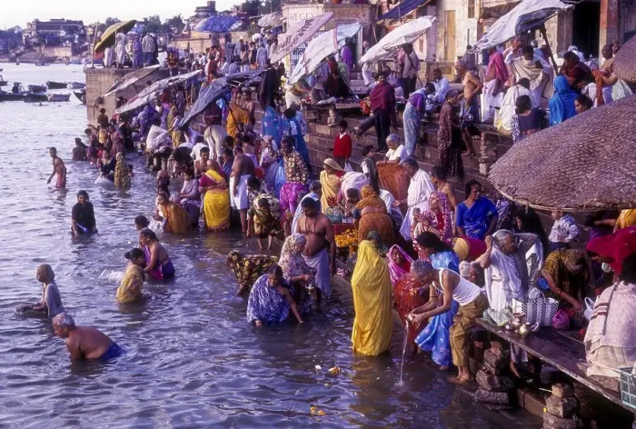 Framed Print : Hindu religious morning rituals in the Ganges Ganga River