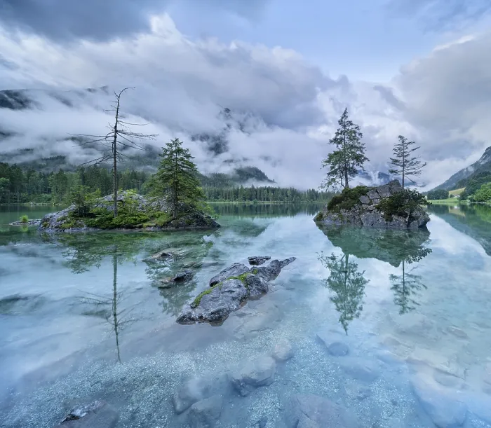 Framed Print : At the Hintersee, low-hanging clouds cover the mountains