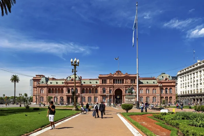 Framed Print : Historic building with surrounding gardens and flag