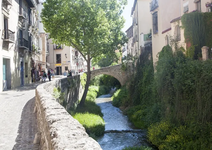 Framed Print : Historic buildings on Carrera del Darro and old bridge over the Rio Darro river Framed Print : Historic buildings on Carrera del Darro and old bridge over the Rio Darro river