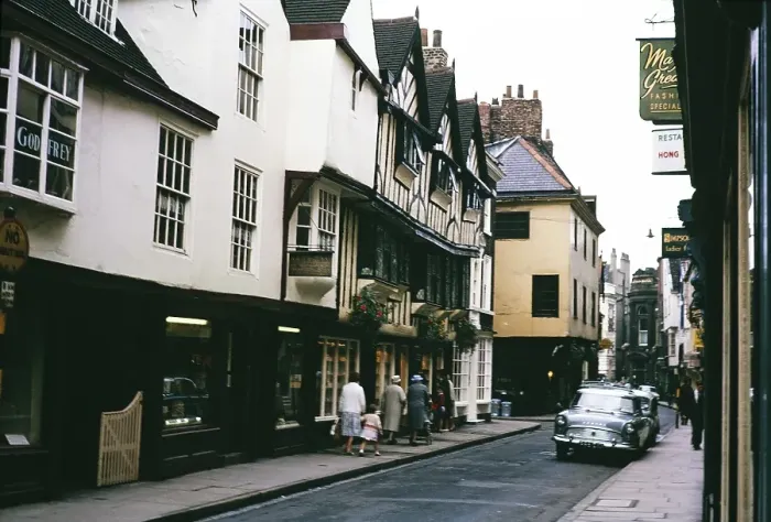Framed Print : Historic buildings, people and cars on the street, Stonegate, York, Yorkshire, England in 1963 Framed Print : Historic buildings, people and cars on the street, Stonegate, York, Yorkshire, England in 1963