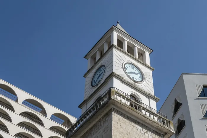 Framed Print : Historic clock tower with modern architecture in the background Framed Print : Historic clock tower with modern architecture in the background