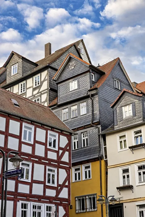 Framed Print : Historic half-timbered houses under a slightly cloudy sky Framed Print : Historic half-timbered houses under a slightly cloudy sky
