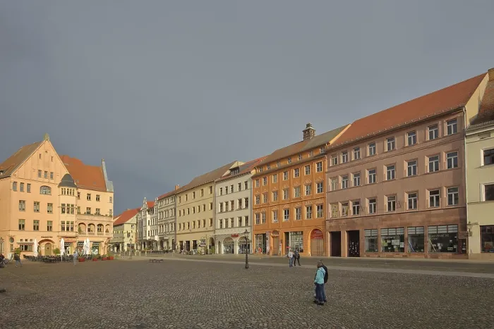 Framed Print : Historic houses on the market square with mood lighting