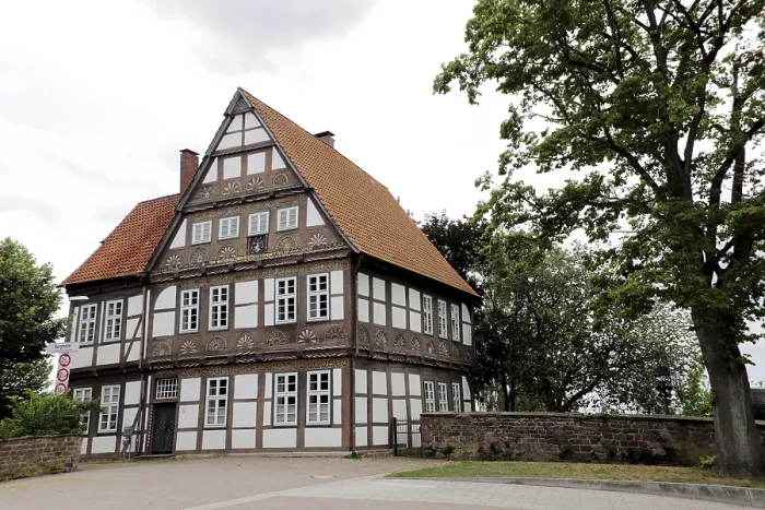 Framed Print : Historic old office building, artistically decorated half-timbered building