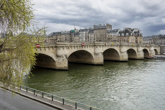 Framed Print : Historic Paris bridge over the river Sena on a cloudy day