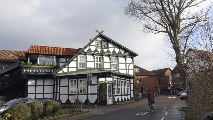 Framed Print : Historic pharmacy in a beautiful half-timbered house