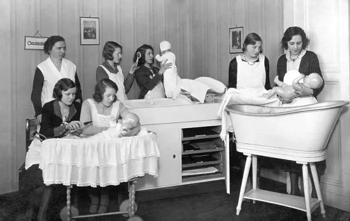 Framed Print : Historic photo, women learning how to deal with newborn babies
