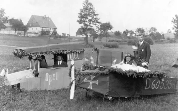 Framed Print : Historic photograph, aeroplane and car made of cardboard