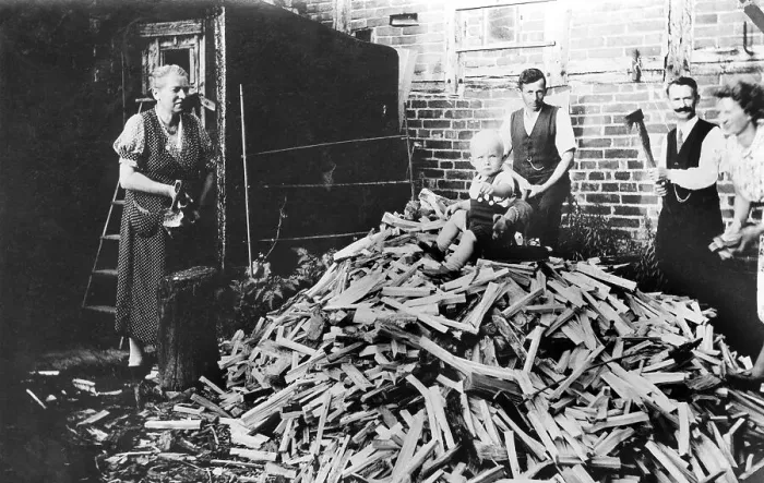 Framed Print : Historic photograph, baby sitting on a pile of firewood Framed Print : Historic photograph, baby sitting on a pile of firewood