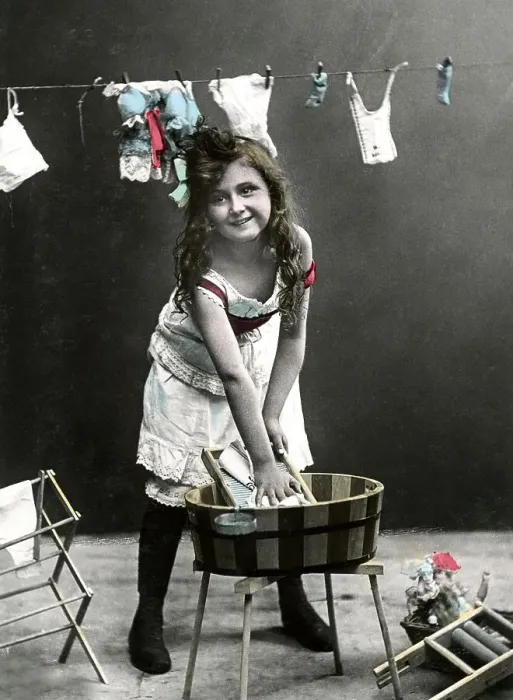 Framed Print : Historic photograph, girl doing laundry