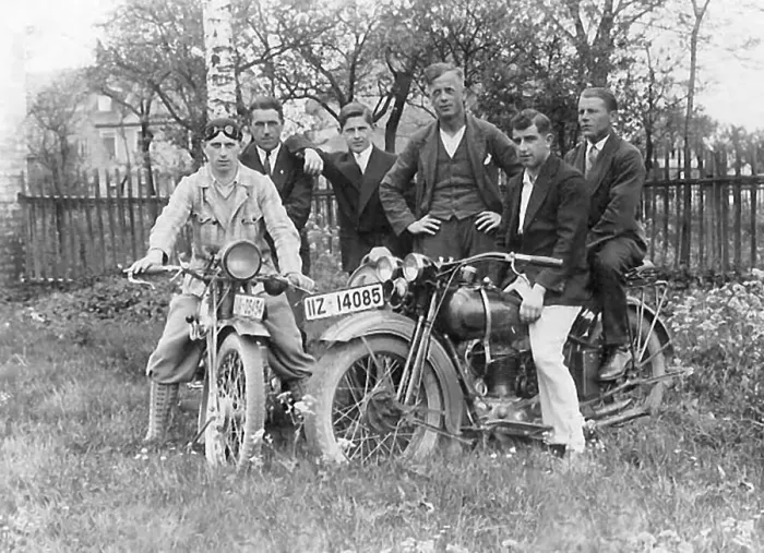 Framed Print : Historic photograph, group of people around a Harley