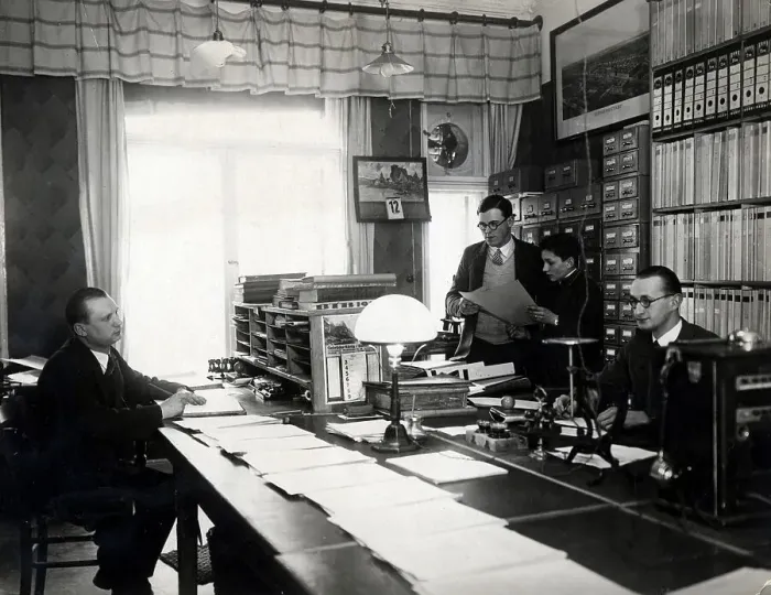 Framed Print : Historic photograph, three men and an apprentice working in an office Framed Print : Historic photograph, three men and an apprentice working in an office