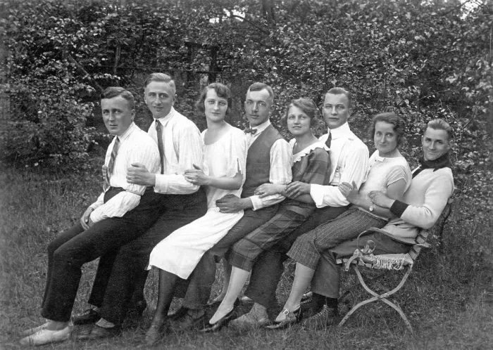 Framed Print : Historic photograph, eight people sitting on one chair