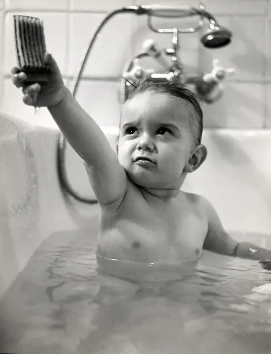 Framed Print : Historic photograph, small boy playing with a brush in the bath Framed Print : Historic photograph, small boy playing with a brush in the bath