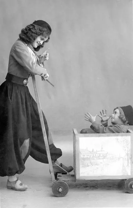 Framed Print : Historic photograph, woman with cheeky child
