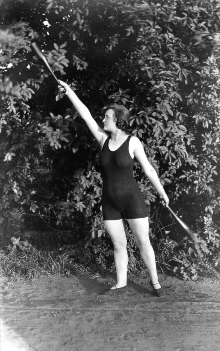 Framed Print : Historic photograph, woman with clubs, around 1921