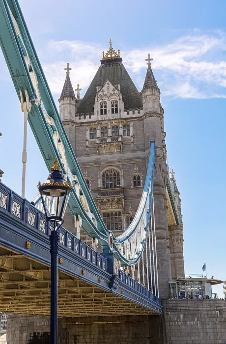 Framed Print : The historic Tower Bridge with towering structures and blue lower section under a clear sky Framed Print : The historic Tower Bridge with towering structures and blue lower section under a clear sky