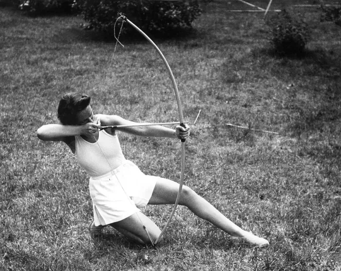 Framed Print : Historical image, woman doing archery, ca. 1940 Framed Print : Historical image, woman doing archery, ca. 1940