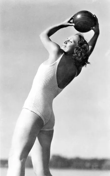 Framed Print : Historical image, woman holding a ball, ca. 1940