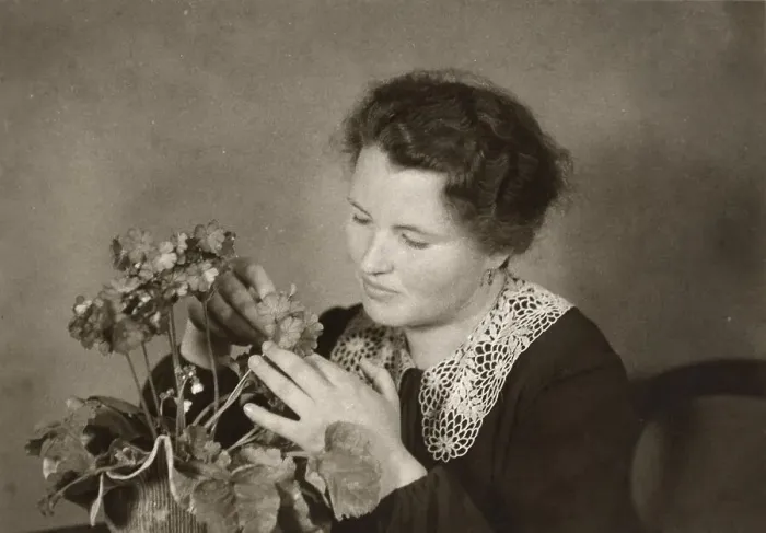 Framed Print : Historical photo, woman arranging flowers