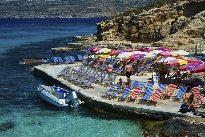 Framed Print : Holidaymakers in deckchairs, Blue Lagoon