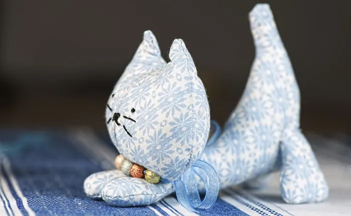 Framed Print : Homemade puppet, a cat