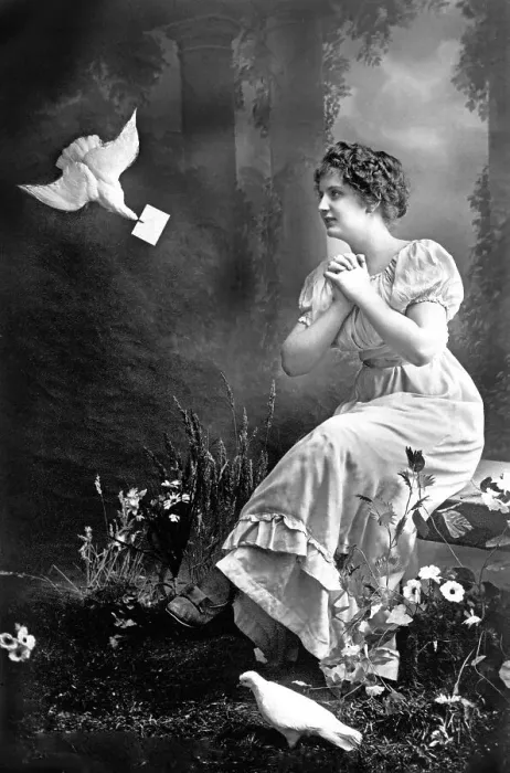 Framed Print : Homing pigeon brings a woman a love letter Framed Print : Homing pigeon brings a woman a love letter