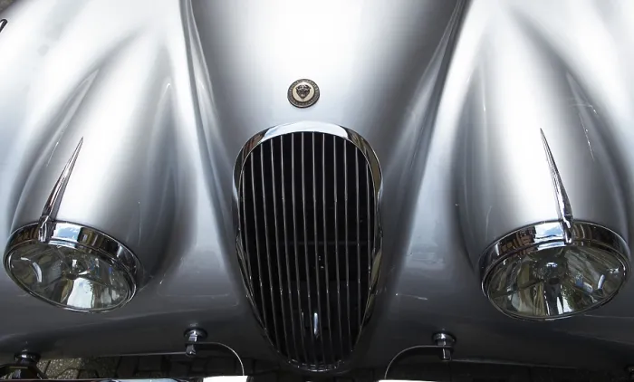 Framed Print : Hood with grill and headlights of a Jaguar Coventry oldtimer