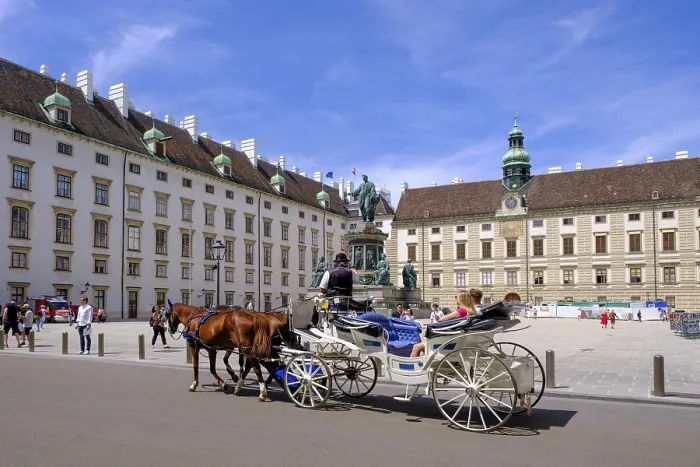 Framed Print : Horse-drawn carriage in front of the Emperor Franz Monument Framed Print : Horse-drawn carriage in front of the Emperor Franz Monument