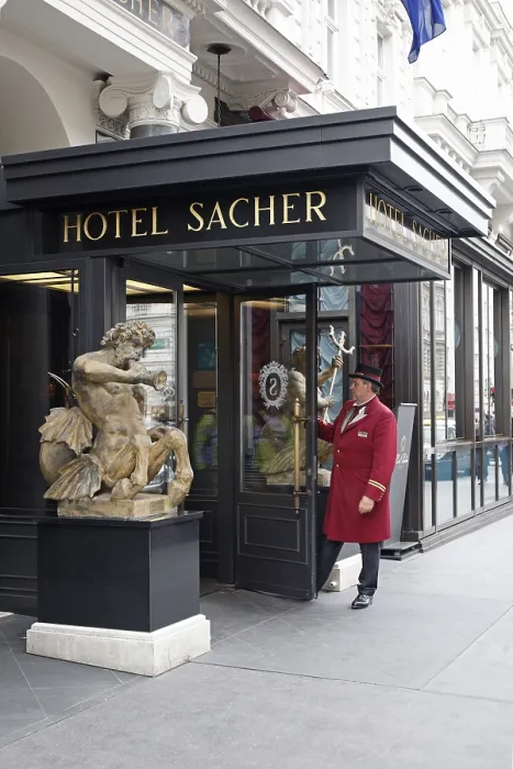 Framed Print : Hotel Sacher, entrance, porter Framed Print : Hotel Sacher, entrance, porter