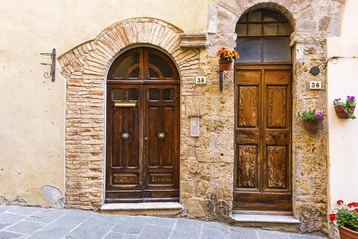 Framed Print : House entrance doors with floral decoration