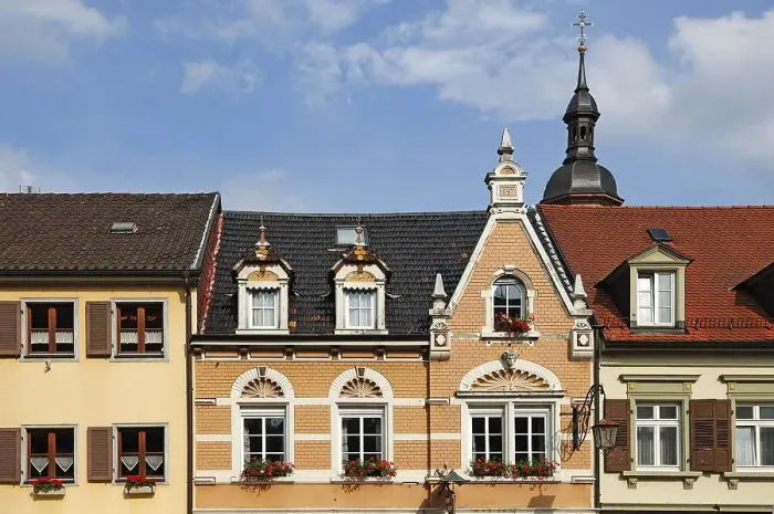 Framed Print : House facade from 1897 behind the tower of the Marienkirche