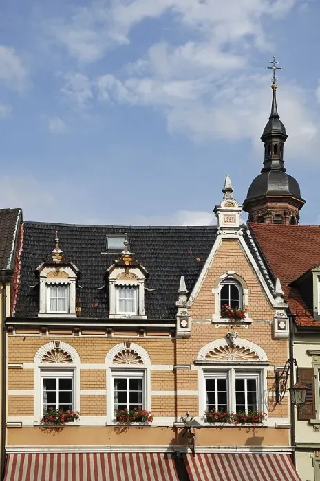 Framed Print : House facade from 1897 behind the tower of the Marienkirche