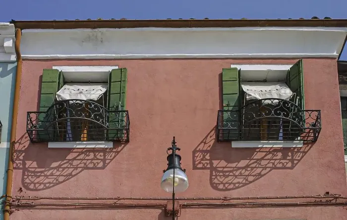 Framed Print : House facade with window flower lattice and lantern Framed Print : House facade with window flower lattice and lantern