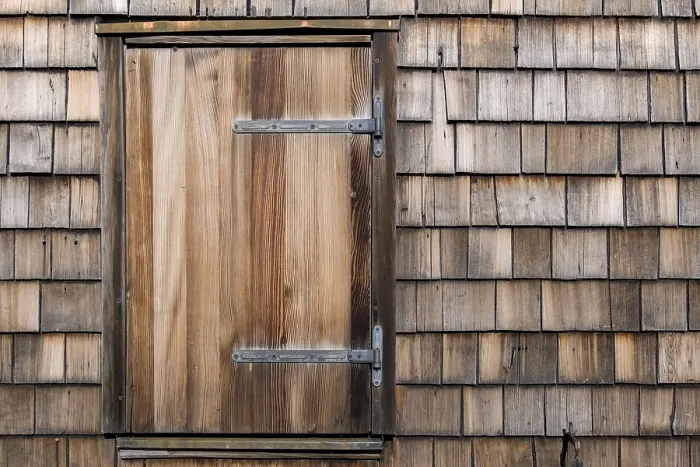 Framed Print : House facade with wooden shingles and windows Framed Print : House facade with wooden shingles and windows
