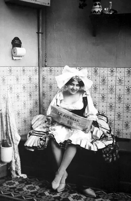 Framed Print : Housemaid on the toilet, 1910s, Germany, Europe Framed Print : Housemaid on the toilet, 1910s, Germany, Europe