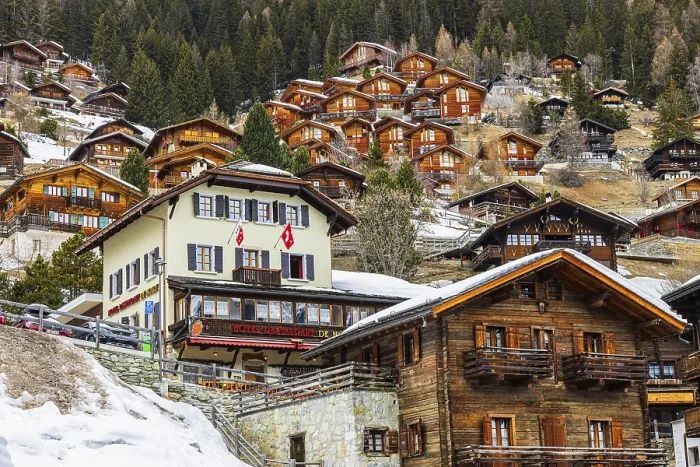 Framed Print : Houses and chalets built into the mountainside