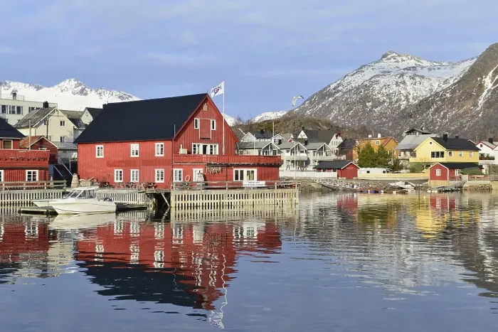 Framed Print : Houses by the harbor, mountains behind Framed Print : Houses by the harbor, mountains behind