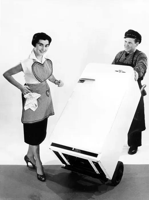 Framed Print : Housewife and supplier, a new refrigerator is delivered Framed Print : Housewife and supplier, a new refrigerator is delivered