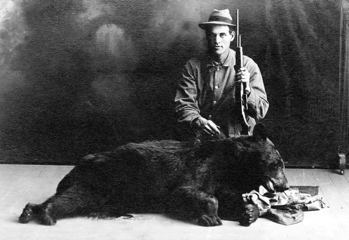 Framed Print : Hunter with a bear, historic photograph Framed Print : Hunter with a bear, historic photograph