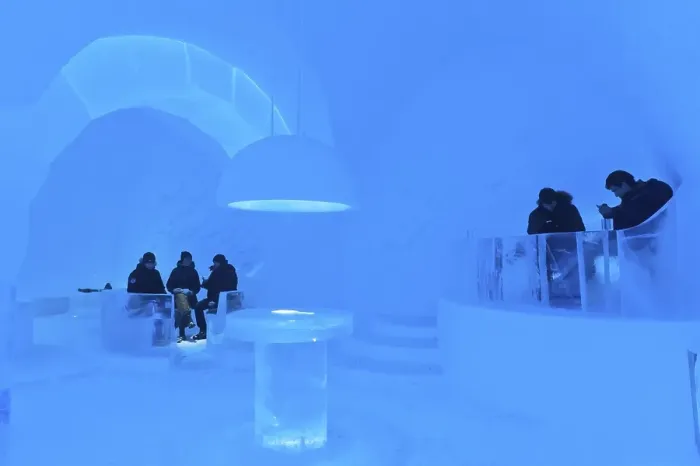 Framed Print : Ice art, people sitting in the Icebar Framed Print : Ice art, people sitting in the Icebar