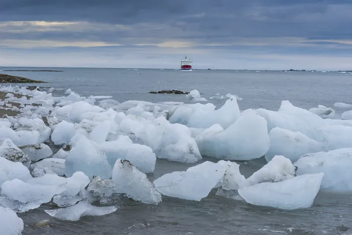 Framed Print : ice floes from glacier at coast