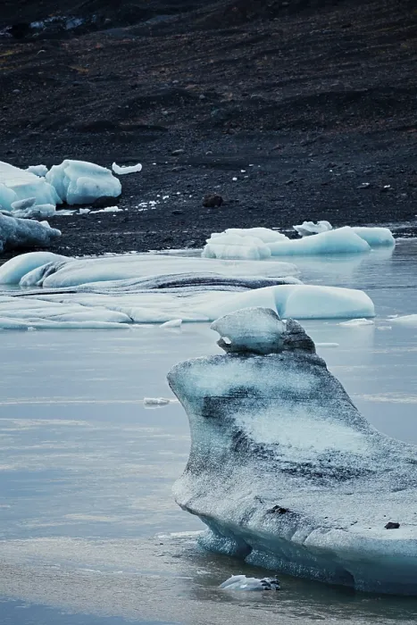 Framed Print : Ice formations in a calm water setting