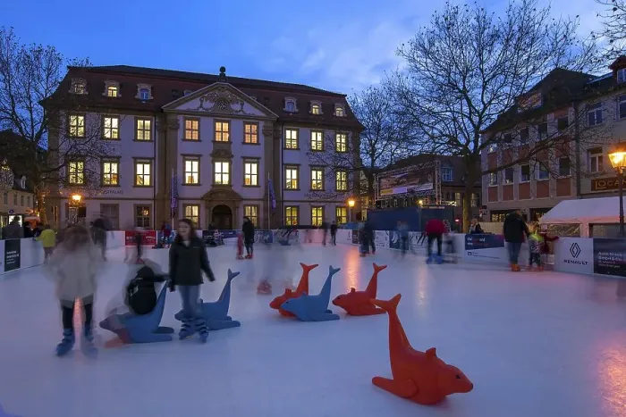 Framed Print : Ice skating rink in colourful evening lighting