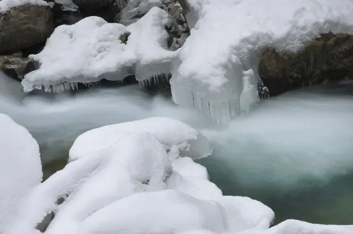 Framed Print : Ice and snow formation over flowing water Framed Print : Ice and snow formation over flowing water