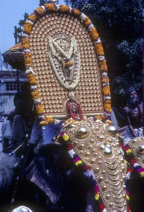 Framed Print : Icon of lord Krishna deity atop Caparisoned elephant in Pooram festival