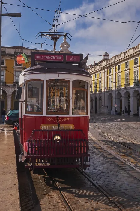 Framed Print : The Iconic and Famous Red Vintage Tram in Terreiro do Paco