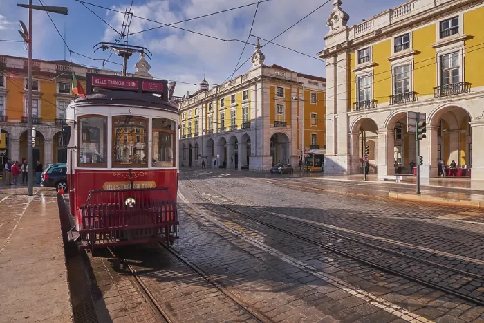 Framed Print : The Iconic and Famous Red Vintage Tram in Terreiro do Paco
