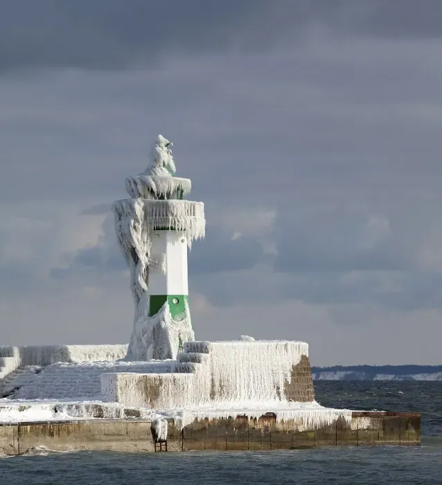 Framed Print : Icy lighthouse in harbour, Baltic Sea